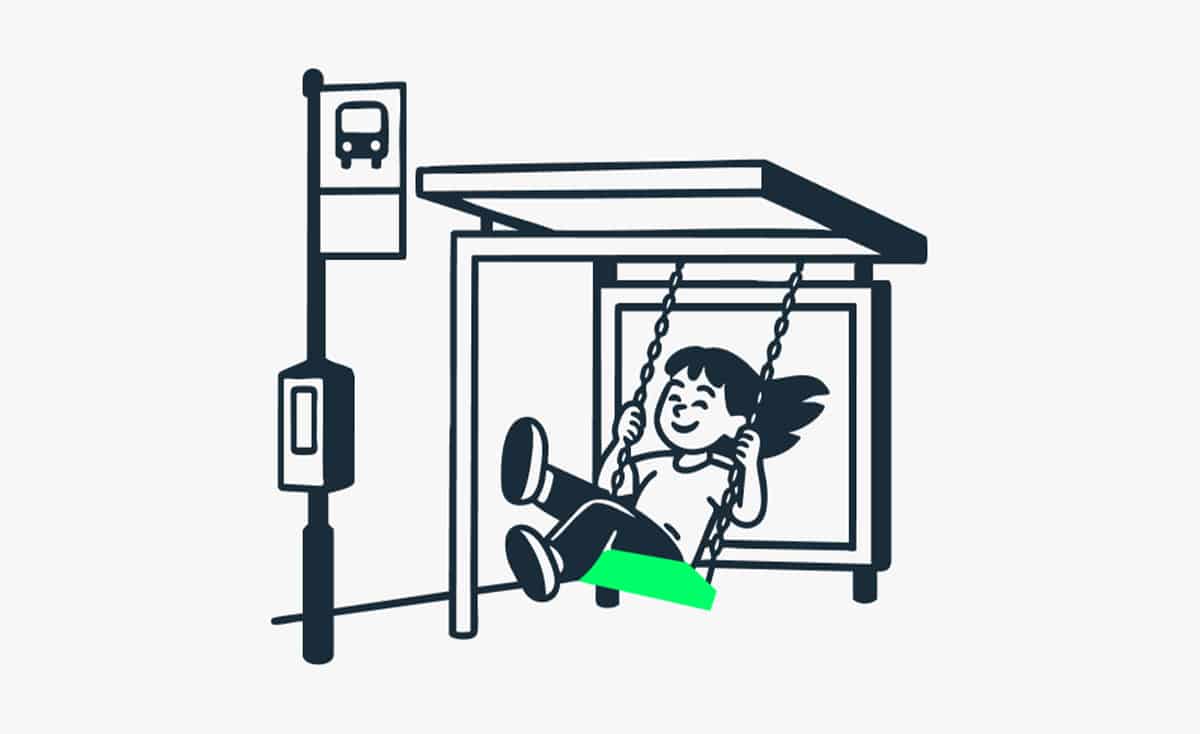 Girl on green swing at bus stop